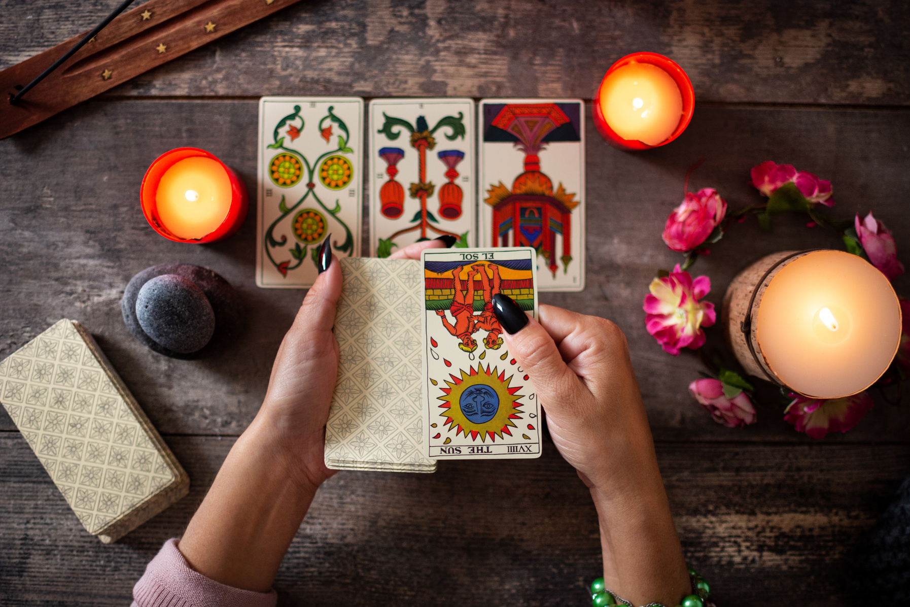 Fortune Teller Reading a Future by Tarot Cards